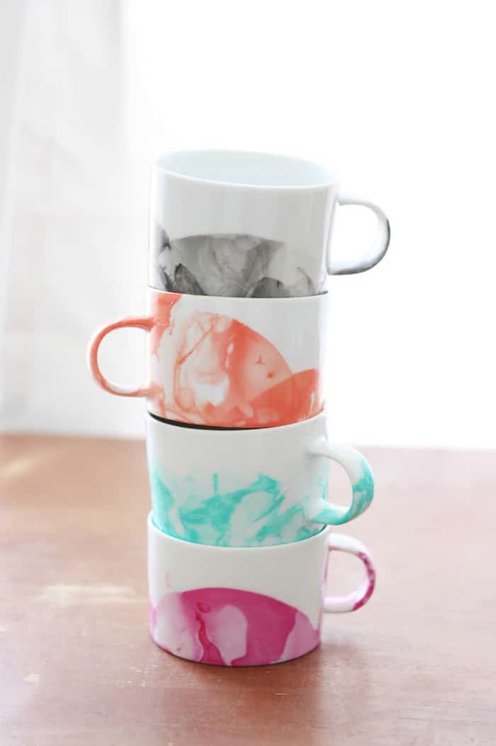 50 Crafts To Make and Sell - Easy DIY Ideas for Cheap Things To Sell on Etsy, Online and for Craft Fairs. Make Money with These Homemade Crafts for Teens, Kids, Christmas, Summer, Mother’s Day Gifts. | DIY Marbled Mugs With Nail Polish #crafts #diy